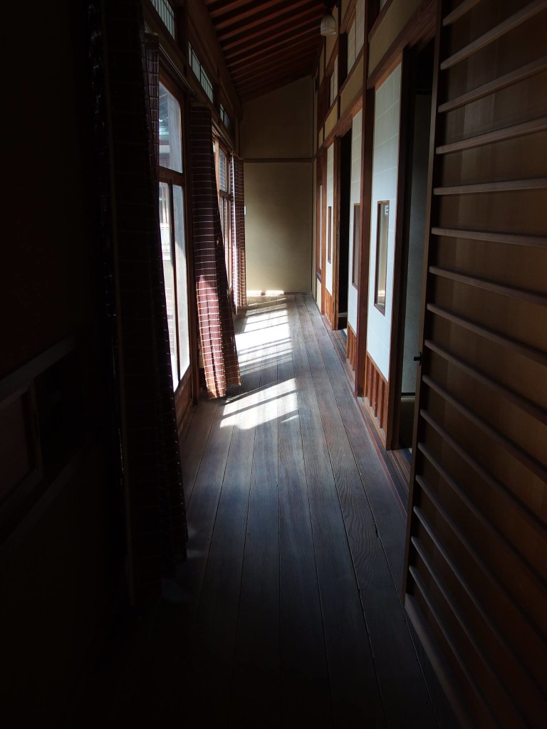 The hallway closer to the doorway. Also the long board used here.